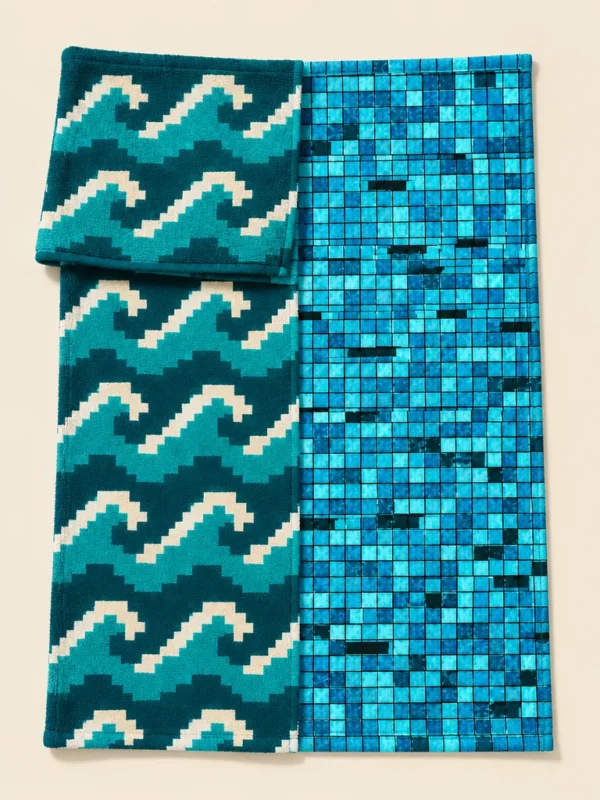 8-Bit Swell × Grout Glitch Split Beach Towel, flat-lay product photo